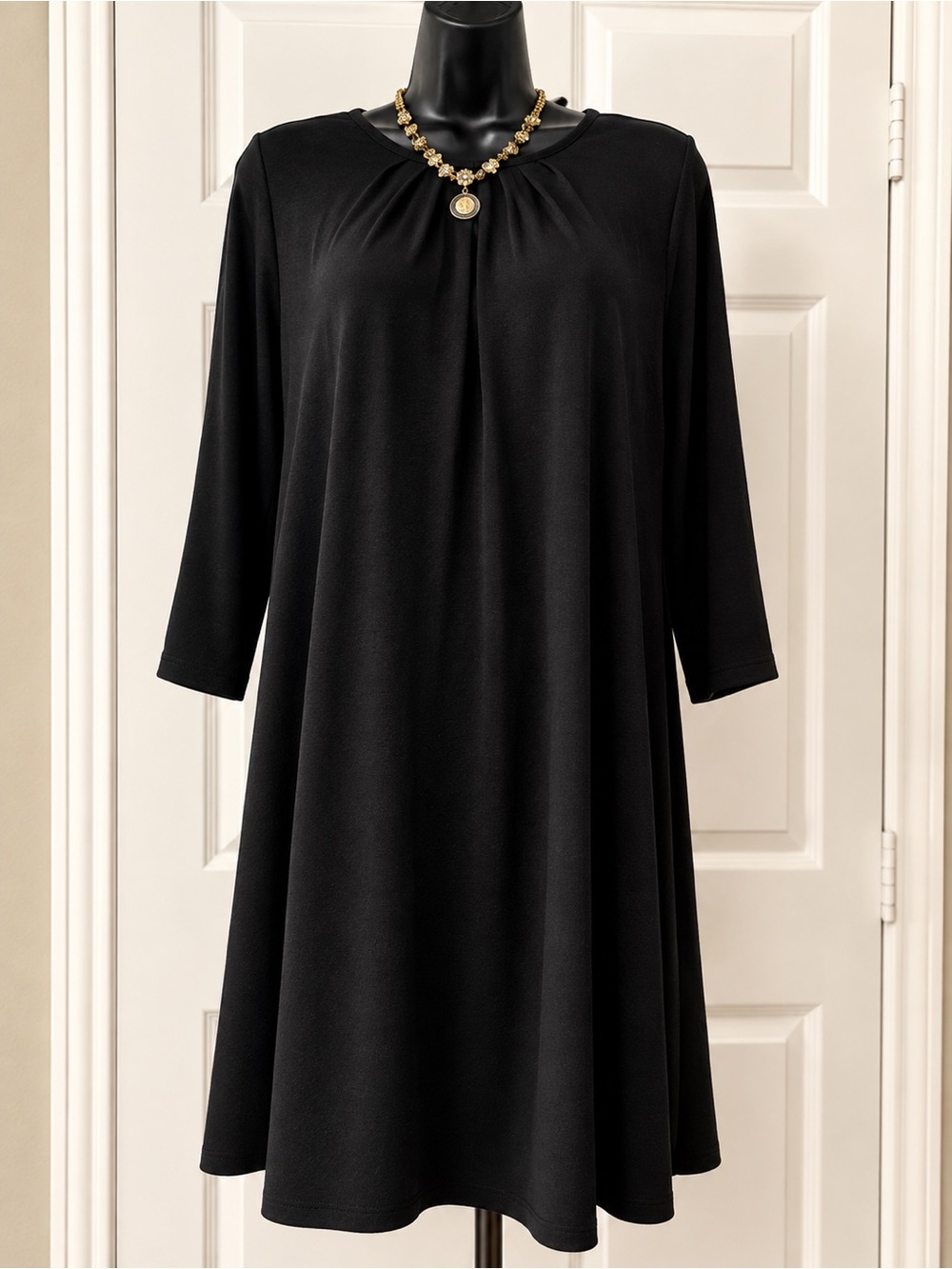 Little Black Dress. Very versatile  3/4 length sleeves. Knee length Size XL.